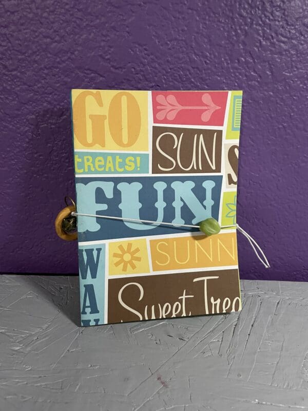 Colorful card with playful text design.