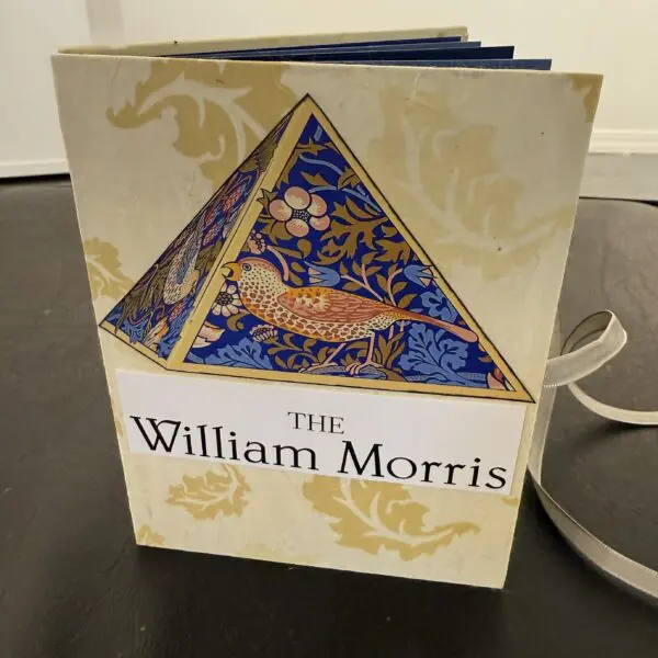 William Morris book cover with decorative design.